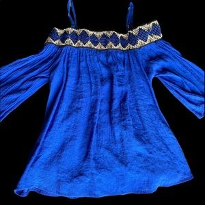 Royal blue top with black/white design